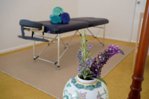 Massage table with flowers